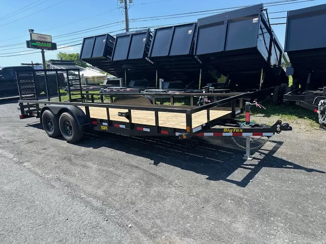 Big-Tex-10PI-7-x-20-Heavy-Duty-Landscape-Trailer-Spring-Assisted-Gate-Wood-Deck-1-1.webp Big Tex 7 x 20 landscape utility trailer with 10K heavy duty ramp