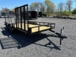 2026 Carry-On 7x16 landscape utility trailer with side ATV ramp and dual axles for sale at TrailerWorld