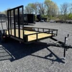 2026 Carry-On 7x16 landscape utility trailer with side ATV ramp and dual axles for sale at TrailerWorld