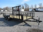 Carry On 7 x 18 landscape utility trailer with mesh sides and side ATV gate for sale at TrailerWorld