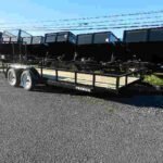 Premier 6.4 x 20 landscape utility trailer with rear ramp gate and dual axles for sale at TrailerWorld