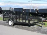 Premier 7 x 14 landscape utility trailer with mesh sides, side ATV ramp and rear ramp gate for sale at TrailerWorld