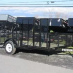 Premier 7 x 14 landscape utility trailer with mesh sides, side ATV ramp and rear ramp gate for sale at TrailerWorld