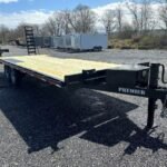 Premier 8.5x24 14K deckover equipment trailer with ladder ramps