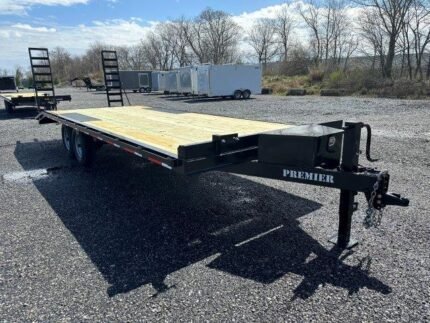 Premier 8.5x24 14K deckover equipment trailer with ladder ramps