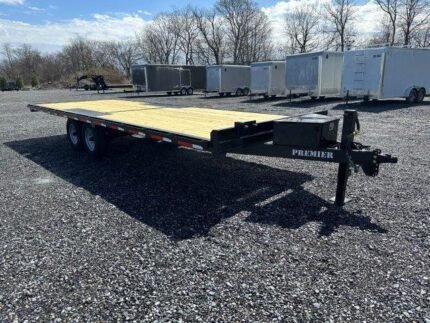 Premier 8.5 x 24 deckover equipment trailer with slide out ramps