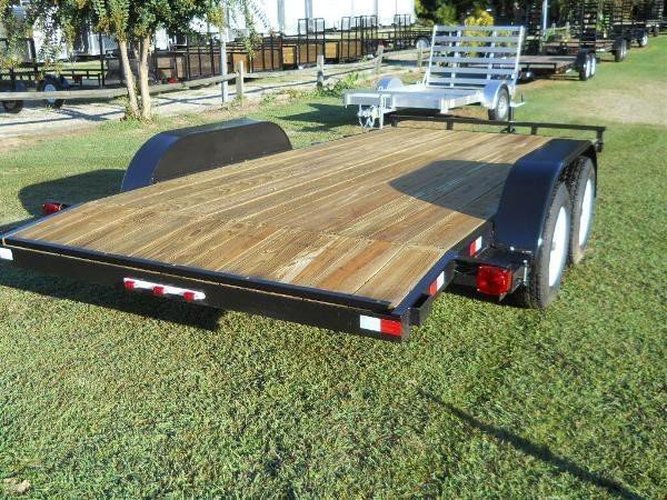 2026 American CH16W 16 foot wood deck equipment trailer with removable drive-over fenders, slide-in ramps and 7000 lb GVWR for sale at TrailerWorld