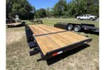 2026 American CH20W 20 foot wood deck equipment trailer with removable fenders, 4 foot beavertail and slide-in ramps for sale at TrailerWorld